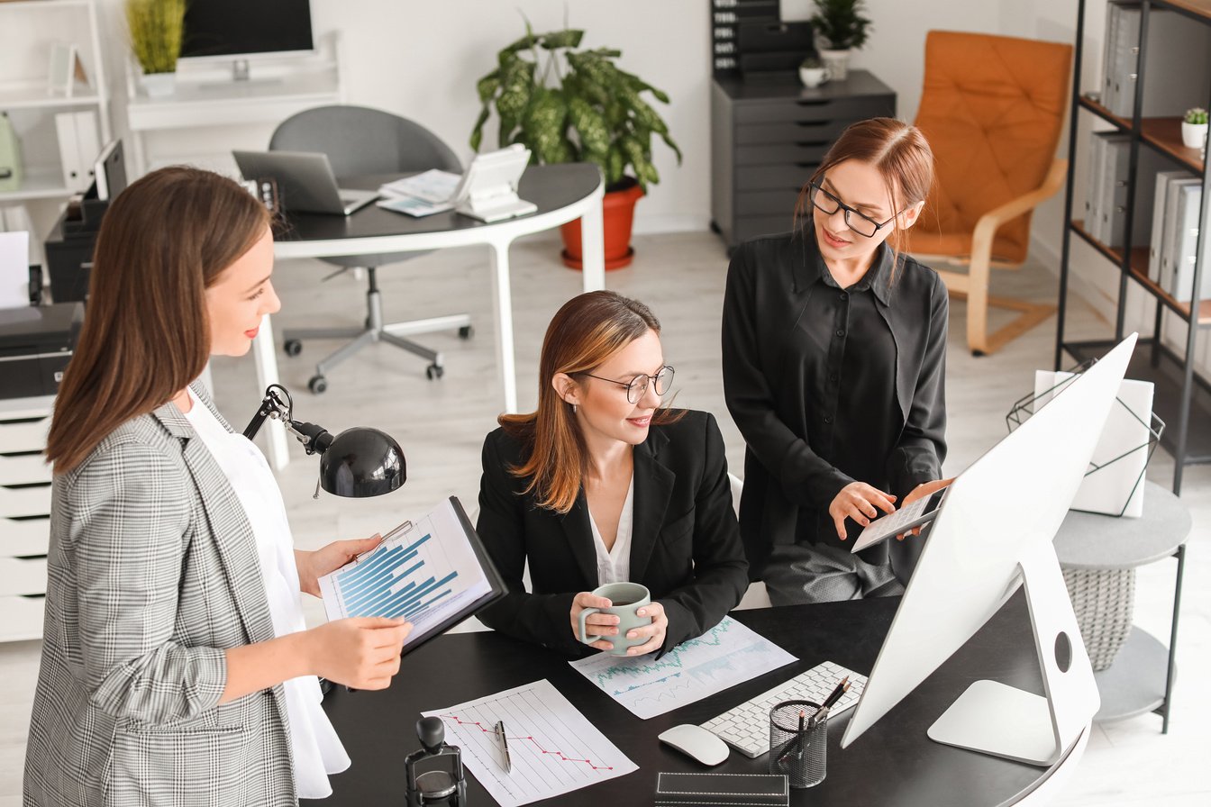 Female Accountants Working in Office